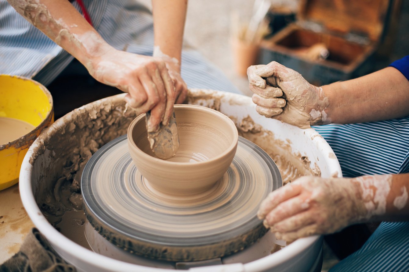 Pottery Workshop. Hands of Adult and Child Making Pottery, Worki